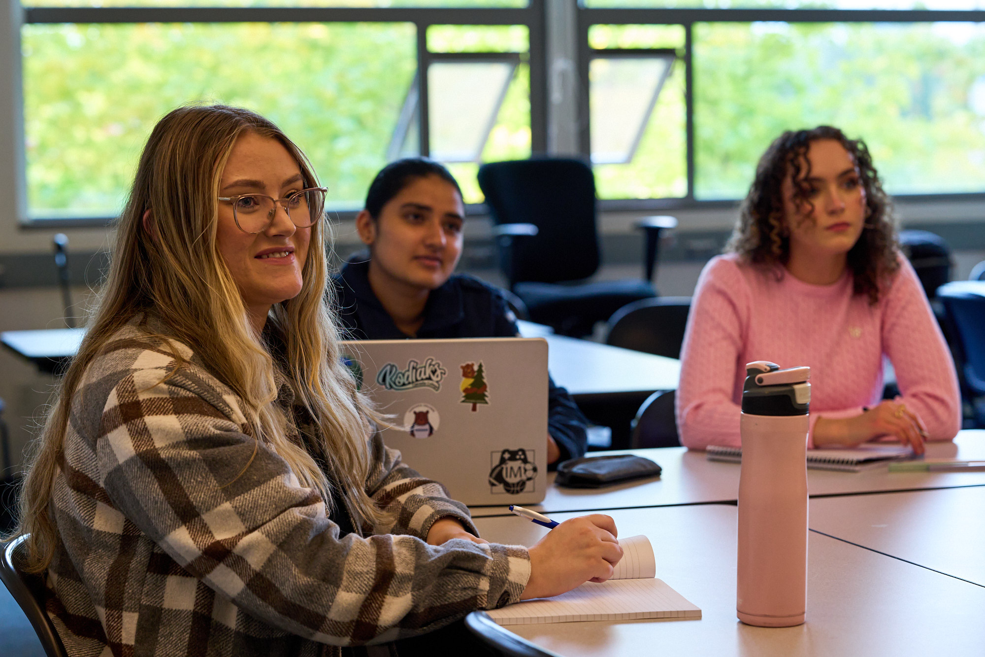 Students listening attentively in class.
