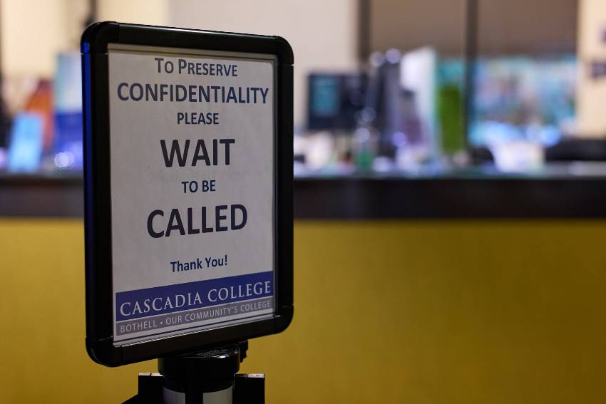 Campus signage indicating the colocation with the University of Washington.