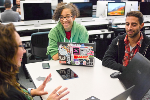 Students having conversation in class.